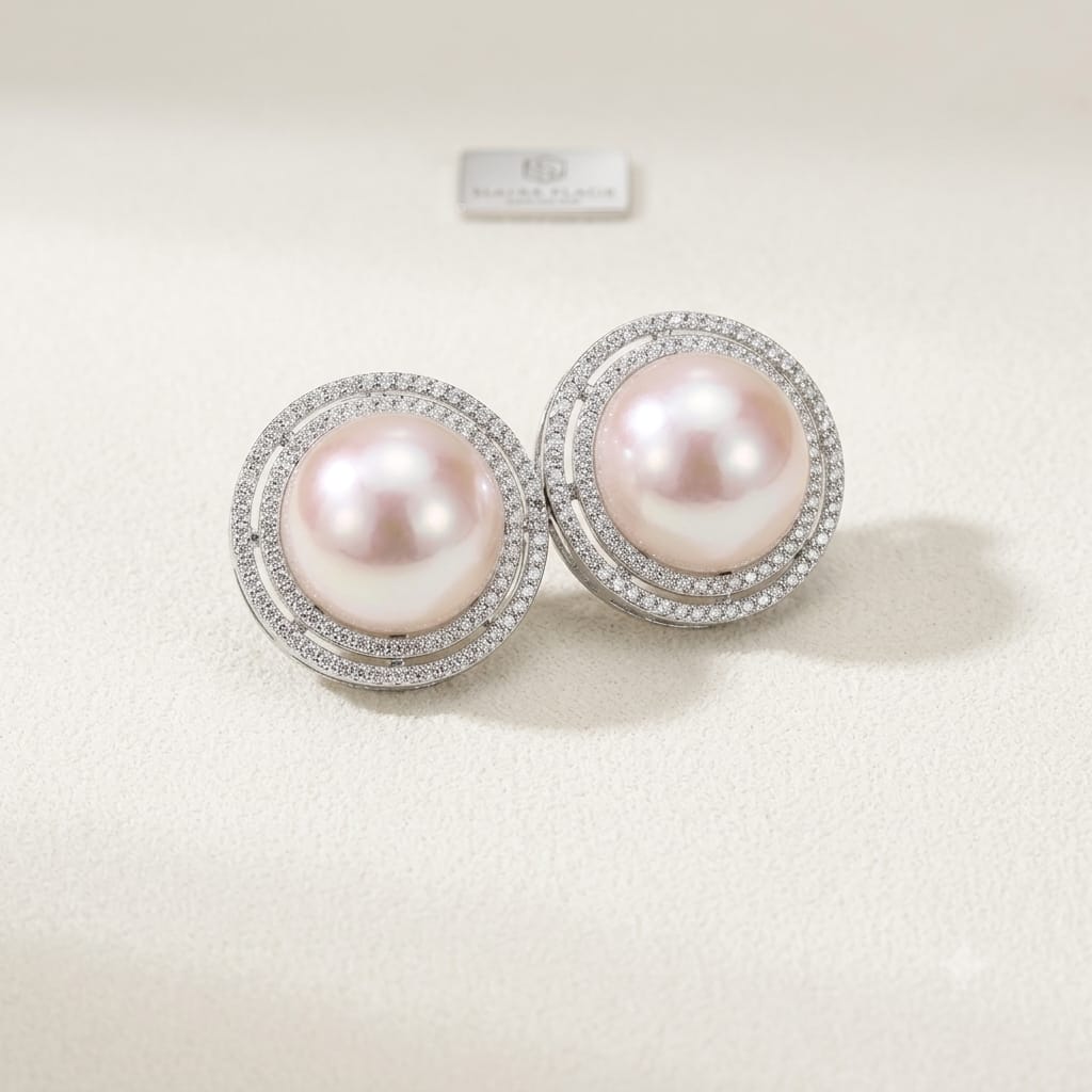 Timeless Pearl Elegance with a Sparkling Halo Finish .